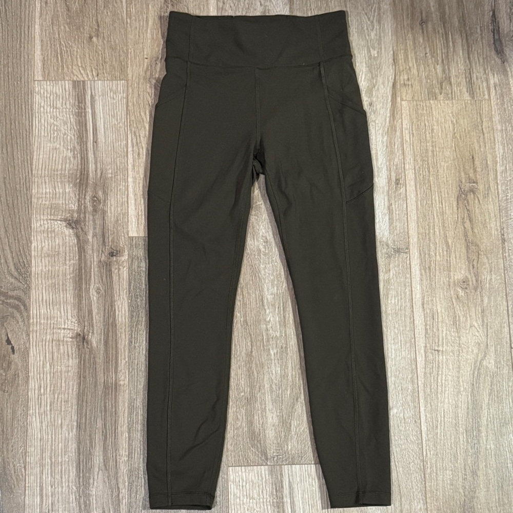 Lululemon Women's High-Waisted Crop leggings Dark Olive with Side Pockets Sz 6